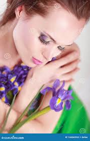 105 Beautiful Girl Holding Purple Iris Stock Photos