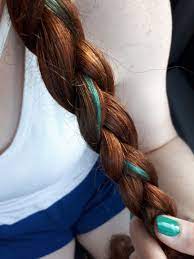 Also known as a red wine color, ask your stylist about infusing burgundy in your dark red hair to produce streaks or highlights for a stunning hairstyle. Natural Red Hair With Teal Streak Teal Hair Color Natural Red Hair Super Hair