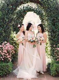 A Pink Garden Wedding Straight From The Storybooks Spring Garden Wedding Plum Bridesmaid Dresses Bridesmaid Dresses Different Colors