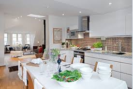 If the living room and kitchen are in one room, they bring a sense of space, but you need to set the whole area so that one of the two rooms without losing their personality. Attic Apartment With A Roof Terrace