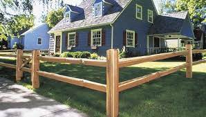 Though wood split rail fence is the most ideal choice for rural areas with huge land space and livestock, some of the city dwellers too have started opting for it during the recent times. Split Rail Fence In Front Of A Home Split Rail Fence Post And Rail Fence Wood Fence