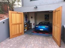 115 Cl15n Design Full Panel Tongue And Groove With Franklin Auto Swing Opener Sedona Az In 2020 Carriage House Garage Doors Carriage House Garage Carriage Doors