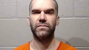 Norman man arrested for threatening to bomb Devon Tower