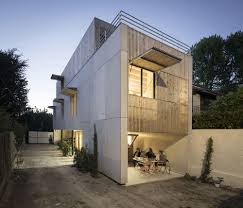 This Concrete Building In France By Raphael Azalbert Is Decorated With Light Wooden Grills With Images Concrete Building Facade Architecture Architecture