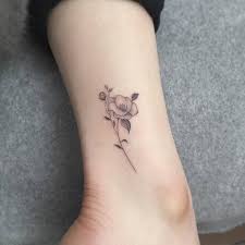 24 Beautiful And Elegant Camellia Tattoo Designs Tattoobloq In 2020 Tattoos Floral Tattoo Design Flower Tattoo On Ankle