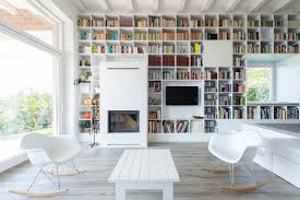 A long stretch of blank wall in your living space can be a problem or it can be an invitation to creative design. Minimalist House With A Long Wall Of Books Idesignarch Interior Design Architecture Interior Decorating Emagazine