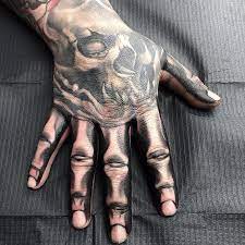 101 amazing skeleton hand tattoo ideas that will blow your mind outsons men s fashion tips and sty skeleton hand tattoo hand tattoos hand tattoos for guys