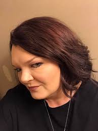 Who is a good hairstylist in Fort Smith, Arkansas?