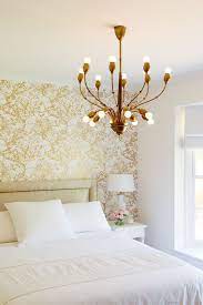 Headboards often replace feature walls in bedrooms, but more and more alternatives emerge to accommodate challenges and needs of the. A Wallpaper Accent Wall Brunch At Saks White Gold Bedroom Gold Bedroom Contemporary Bedroom