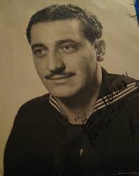 This was my cousin, Gene Santomas. He had a barber shop