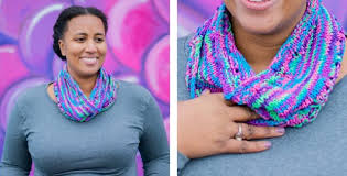 Here's a versatile design that can be worn around the shoulders are wrapped as a cowl. Colorful Eyelet Knitted Cowl Free Knitting Pattern