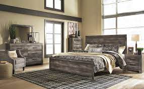Creating an industrial style room? Wynnlow 5 Piece Panel Bedroom Set In Gray