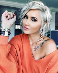 45 New Asymmetrical Pixie Cut Ideas  https://hairstylestrend.com/asymmetrical-pixie-cut/ #asymmetricalpixie  #pixiecut #pixiehaircut #pixiehair #pixiecuts