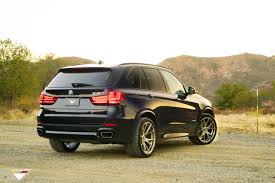 Customized Black Bmw X5 Rocking A Set Of Forged Vorsteiner Wheels Bmw X5 Bmw Black