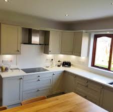 Stunning grey gloss kitchen with porcelain tiled floor and corian worktops. Ld Units Creative Kitchens Bedrooms Posts Facebook