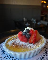 Experience the perfect blend of creamy vanilla bean and fresh berries in  our new crème brûlée! A classic treat that's sure to satisfy your sweet  tooth!