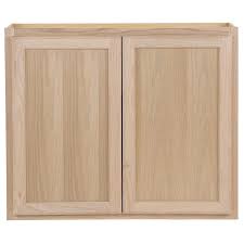 Otherwise, a slab door with exposed hinges will look as dysfunctional as driving a ferrari through a snowstorm 😉. Project Source 36 In W X 30 In H X 12 In D Natural Unfinished Oak Door Wall Stock Cabinet In The Stock Kitchen Cabinets Department At Lowes Com