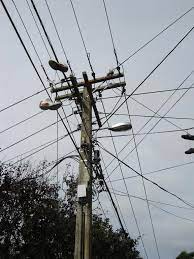 Electric fields are produced by electric charges, and magnetic fields are produced by the flow of electrical current through wires or electrical devices. Utility Pole Wikipedia