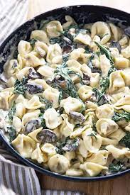 Creamy Spinach Mushroom Tortellini Recipe The Salty Marshmallow Recipe Tortellini Recipes Recipes Healthy Pasta Recipes