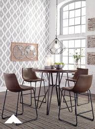 Centiar Two Tone Brown Mid Century Style Dining Room Table Set By Ashley Furniture Ashleyfurnitu Round Dining Room Table Round Dining Room Dining Room Sets