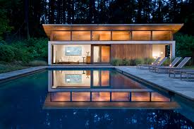 Even a small pool house likely requires a building permit in your area. A Small House With A Big Pool Casual Opulence