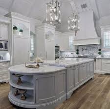 This white kitchen is super stylish. Top 70 Best Vaulted Ceiling Ideas High Vertical Space Designs Vaulted Ceiling Kitchen White Modern Kitchen Gorgeous Kitchens