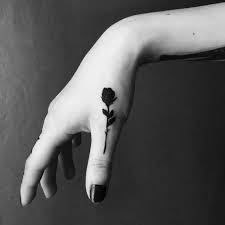 A Black Small Rose Tattoo On A Thumb By Berkin Donmezz Black Rose Tattoos Thumb Tattoos Black Tattoos