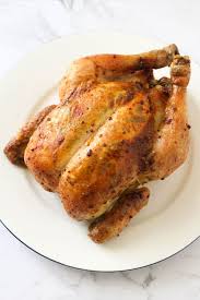 Place the chicken, breast side down, on a rack in a roasting pan. Roast Chicken With Lemon And Rosemary Cook It Real Good