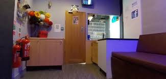 3 showers (each w/ a soap dispenser), 1 toilet, 1 urinal, 1 sink, small lockers, shoe cubbies, cotton swabs, tissues, body lotion, and a short bench. Gay Sauna London The Locker Room Sauna And Steam