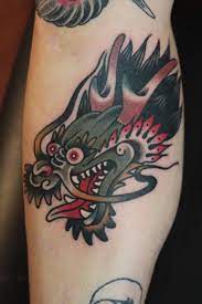 Dragon head by jenni liukkonen japanese tattoo art house. 18 Vibrant Traditional Dragon Tattoos Dragon Head Tattoo Traditional Tattoo Dragon Japanese Dragon Tattoos