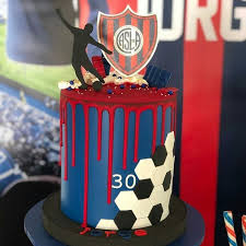 They love baseball just as much as they love football, and or them playing basketball. Modern Drip Football Cake Soccer Cake Soccer Birthday Cakes Boy Birthday Cake