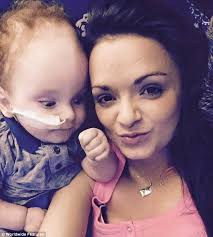 Baby born without a brain celebrates his 2nd birthday and says 'Mummy' for  first time