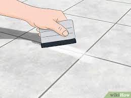 I cleaned the grout by hand today and it looks fine, at least for now. 4 Ways To Stop Floor Tiles From Cracking Wikihow