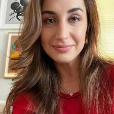 She's holding a wine glass. Case closed