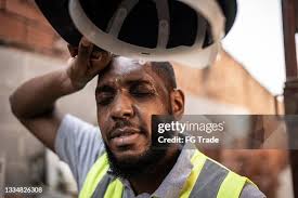 31 Construction Worker Wiping Sweat Stock Photos, High-Res Pictures, and  Images