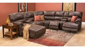 Sitting Back Or Lying Down This Sectional Is Great For Lounging Around On A Rainy Day Slumberland Furniture Cabin Furniture Sectional