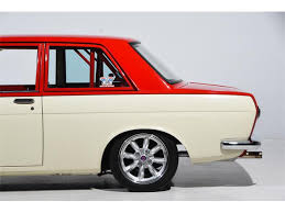 Image result for Gold Bronze 1959 Datsun