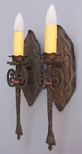 Free shipping on spanish style wall sconces! 1920s Pair Of Single Spanish Revival Sconces 1stdibs Com Spanish Revival Sconces Wall Lights