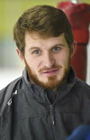 Tucker Grose leaves as Trinity Catholic hockey coach