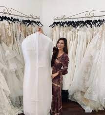 Carlin Bates With Her Wedding Dress In Her Hand Carlin Bates Tori Bates Bates Family Blog