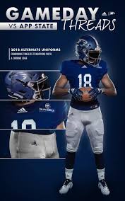 A street of uniform tall white buildings. Uni Watch Alternate Uniforms For Georgia Southern Eagles Football Facebook