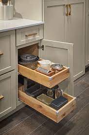 We are almost done with our kitchen design and my husband just mentioned that he'd like higher counters (he's 6'7, however an only occasional cook). Base Cabinet With Roll Trays Diamond Cabinetry Tall Kitchen Cabinets Kitchen Wall Cabinets Diamond Cabinets