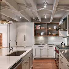 Redeeming A Remuddled Row House Interior In Cobble Hill Basement Ceiling Painted Basement Kitchen Basement Lighting