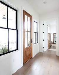 Black Windows Building A House Is All About Saving Money Where You Can To Get Our Windows Pre Finished In Black On T Interior Windows Home Wood Doors Interior