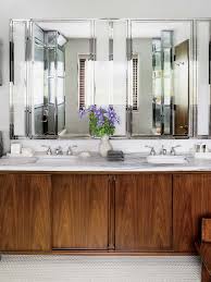 Bathroom double sink vanity with small make up area in its central part. 18 Great Ideas For Bathroom Double Vanities Architectural Digest