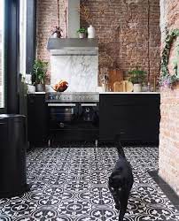 Black Kitchen Cupboards I Brick Wall I Black And White Tiles Brick Tiles Kitchen Brick Wall Kitchen White Kitchen Floor