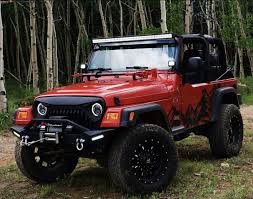 2005 Jeep Tj 33 Inch Tires Fuel 18 Rims Halo Lights Blade Bumper Led Light Bar And Spots Gladiator Grille Jeep Tj Jeep Wrangler Jeep