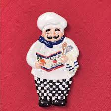 The whimsical chef holding bread and pasta is a fun way to decorate while the black and white checker. Kitchen Spoon Rest Fat Bistro Chef Spoon Rests Spearhead Kitchen Dining