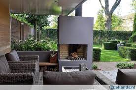 mooie openhaard in de tuin door hethippehuis buitenruimte openlucht woonruimtes tuin