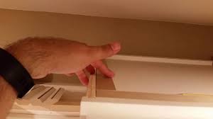 Crown molding helps to dress up cabinets and hide dusty soffit spaces. Diy Installing Large Crown Molding On Rta Kitchen Cabinets Youtube